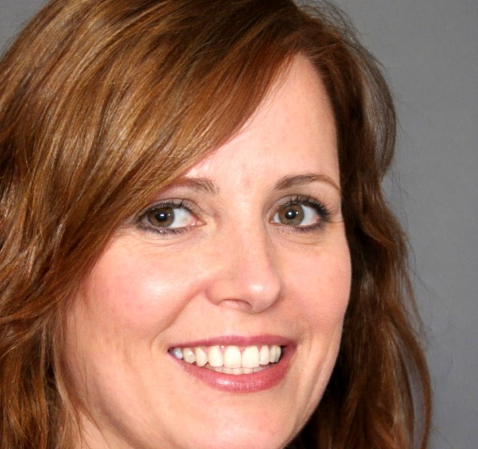 Professional headshot of media industry expert mentor