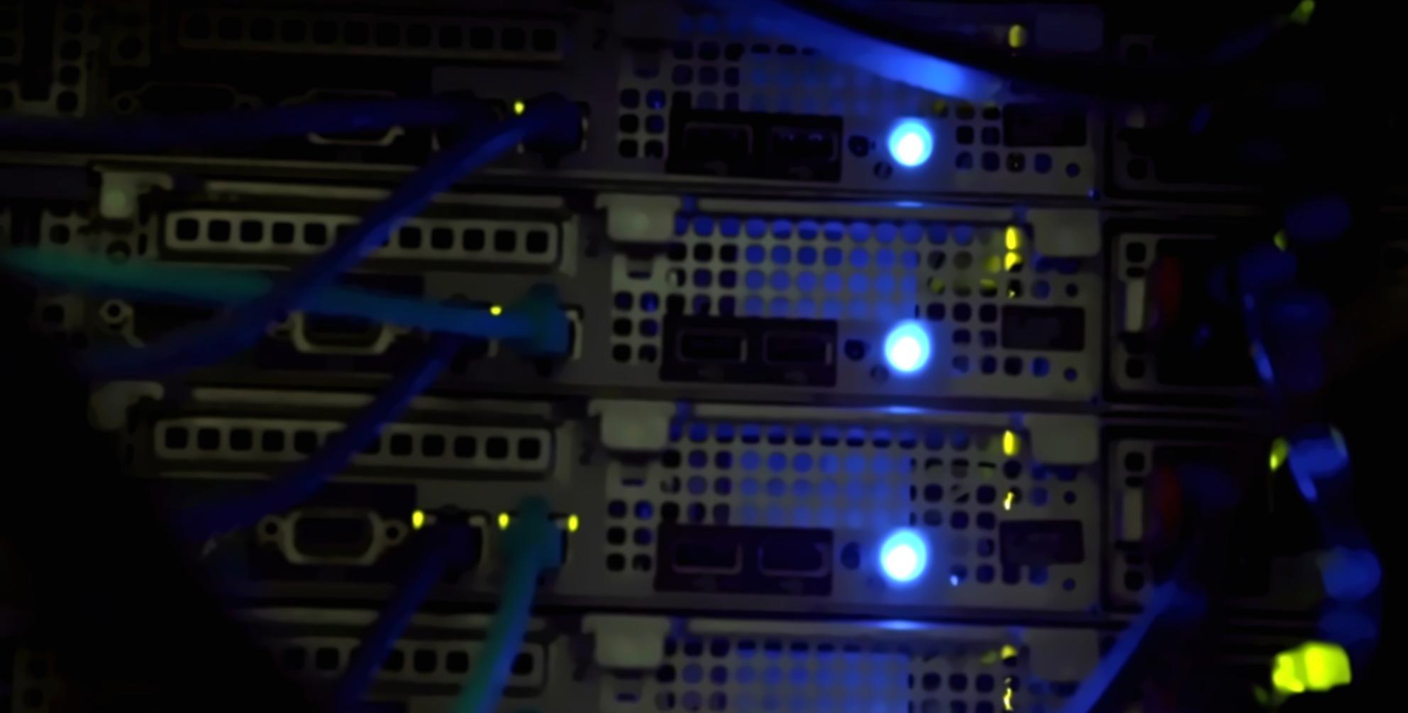 Students collaborating on blockchain media projects in modern learning environment